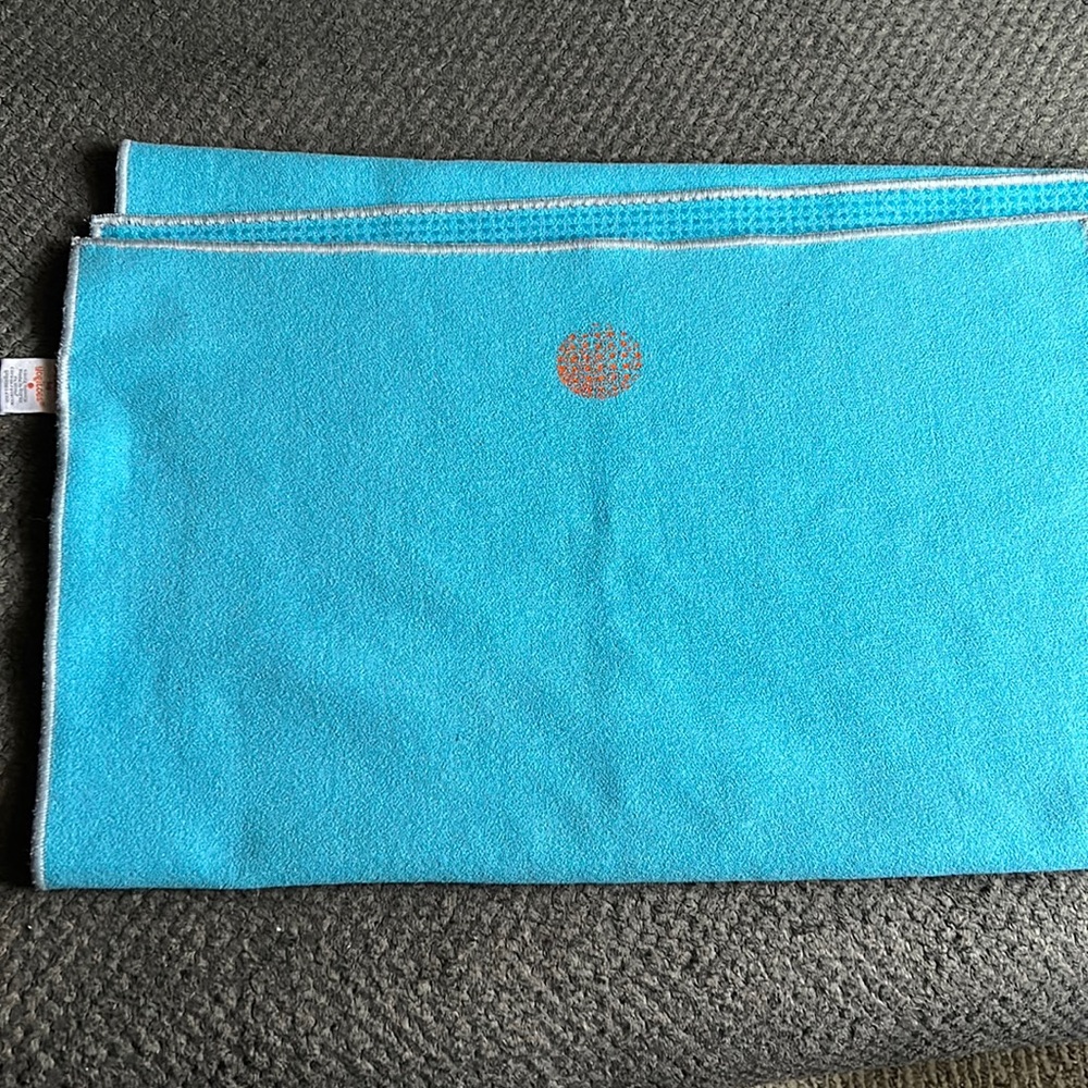 Used yogi toes Lululemon yoga mat with grips on the back.